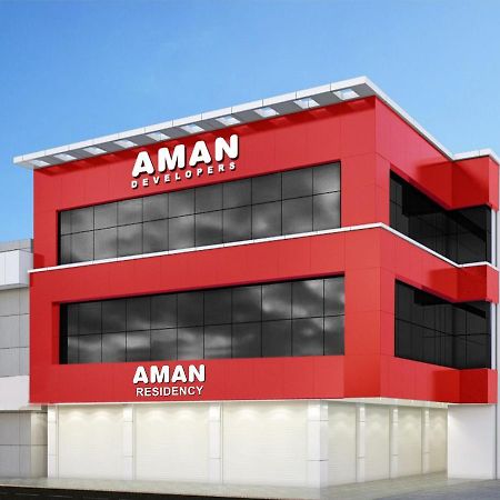 Aman Residency Hotell Thodupuzha Exteriör bild